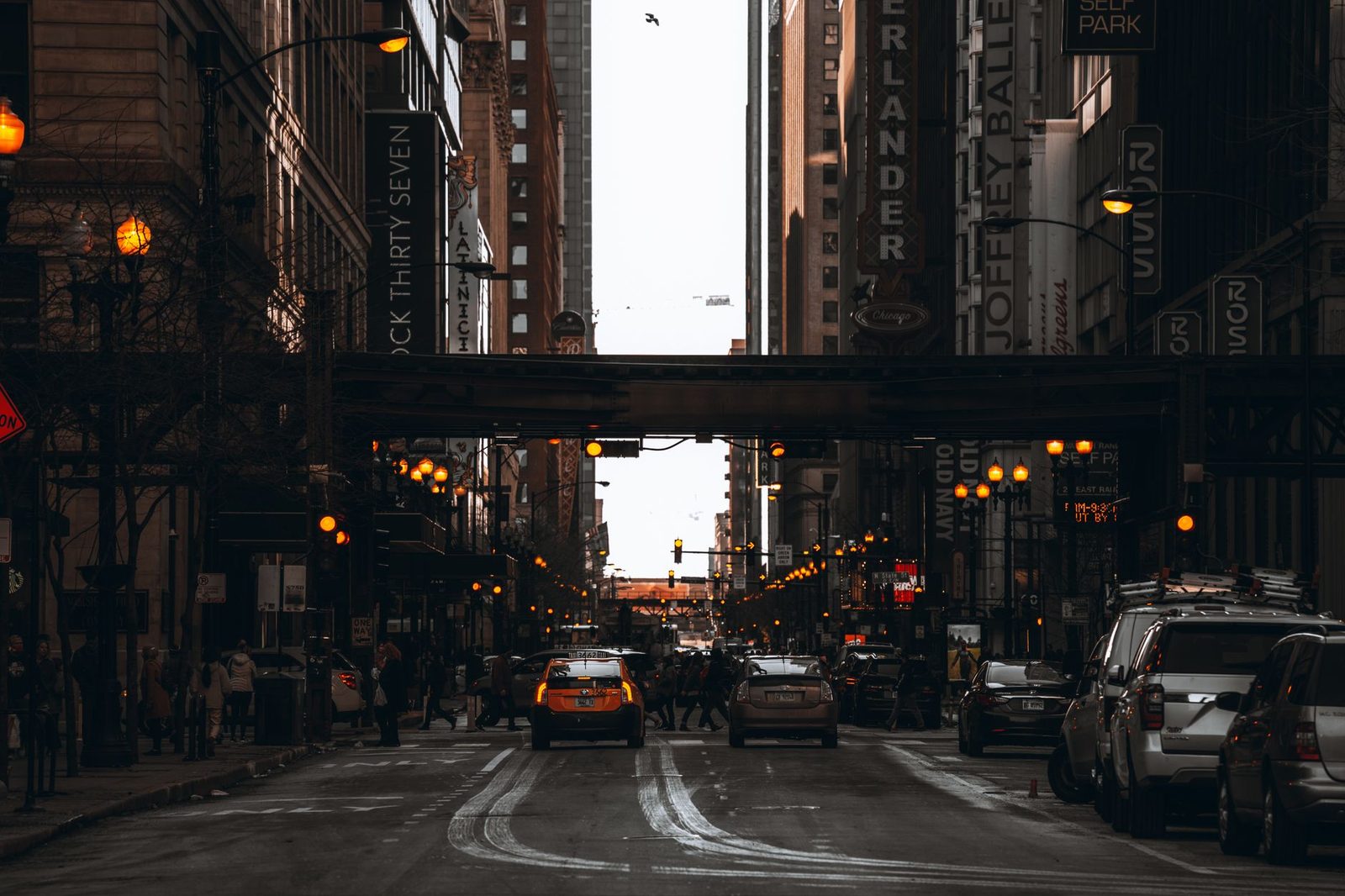 A downtown Chicago street at dusk