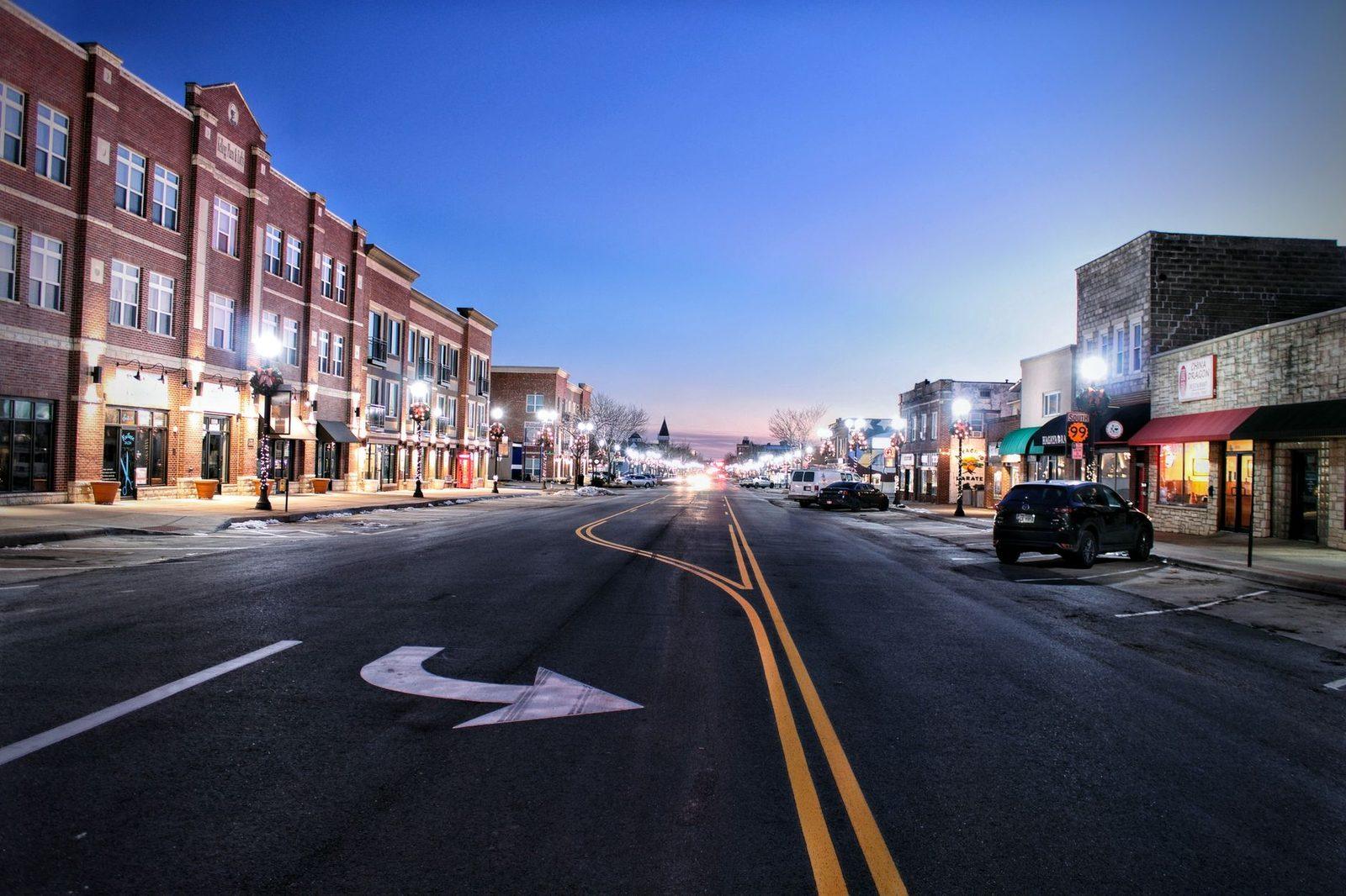 Main Street in Emporia, Kansas at twilight, a Central-time small town inside a twelve-state Midwest text messaging footprint